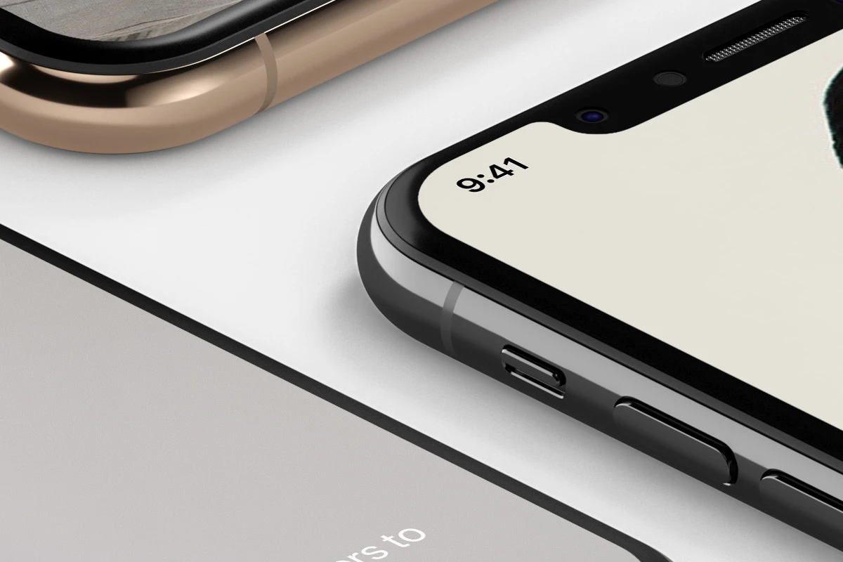 iPhone XS Isometric Free Mockup - This is a perspective psd iPhone XS mockup isometric set to showcase your designs with all the iPhone XS psd colors. Easily add your own graphics with the smart layers.